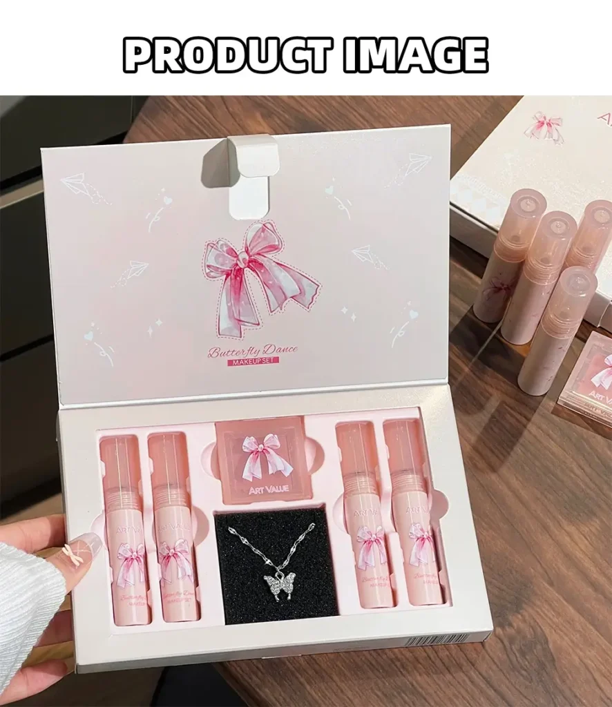 Hand holding four Art Value lipsticks from the Butterfly Dance makeup set