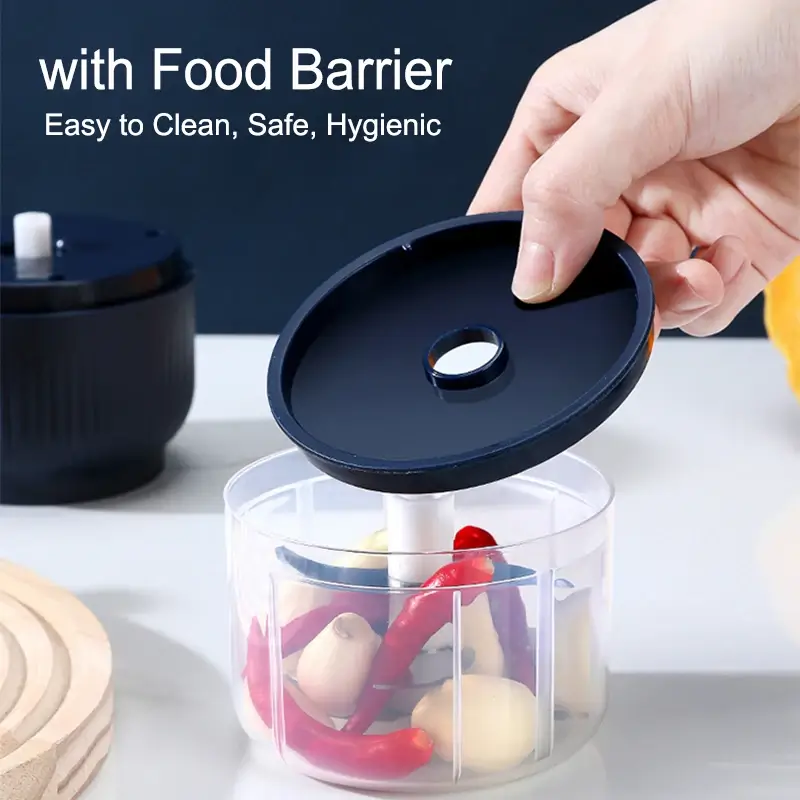 Mini electric chopper with food barrier for hygienic cleaning