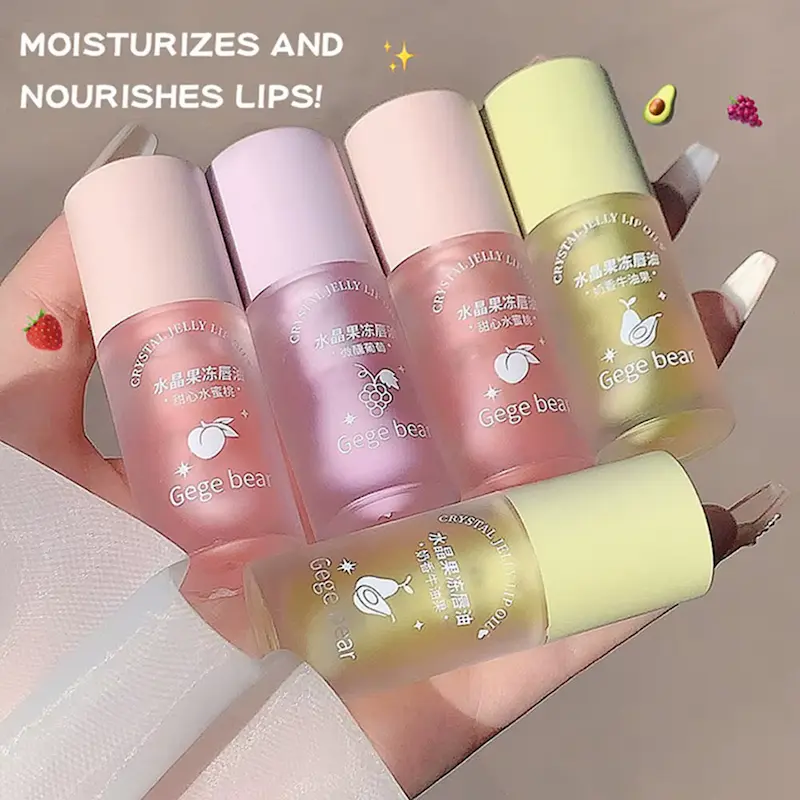 Gege Bear Crystal Jelly Fruit Lip Oil bottles in Peach, Grape, and Avocado variants for lip moisturizing.
