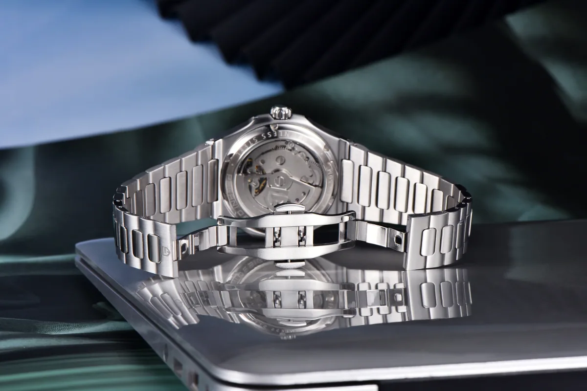 The secure stainless steel butterfly clasp of a Pagani Design watch bracelet.