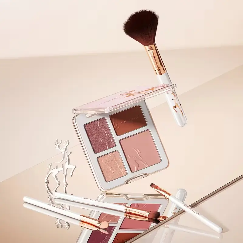 4-shade neutral eyeshadow palette with professional makeup brushes for a complete look.