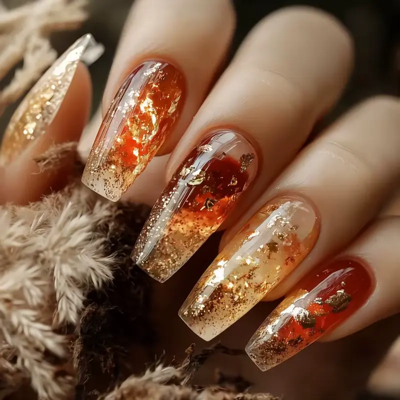 Finished fashion glitter ballet press on nails with gold foil flakes.