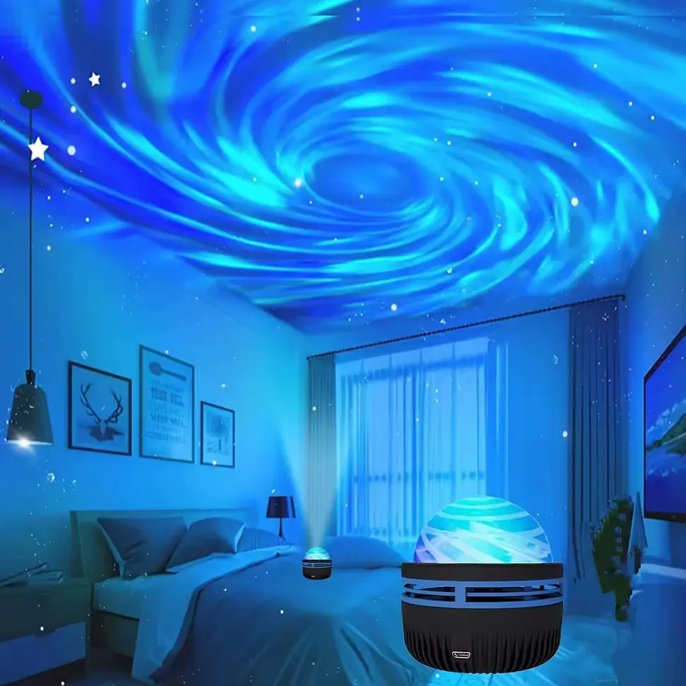 Blue swirling galaxy light effect projected on a bedroom ceiling from a small LED device.