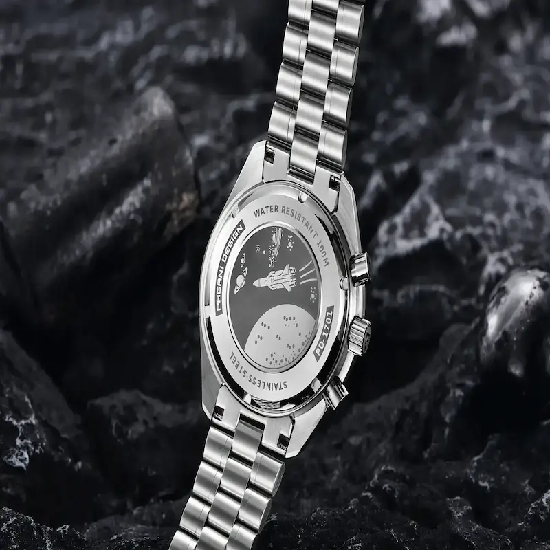 Solid stainless steel case back featuring a detailed space shuttle engraving.