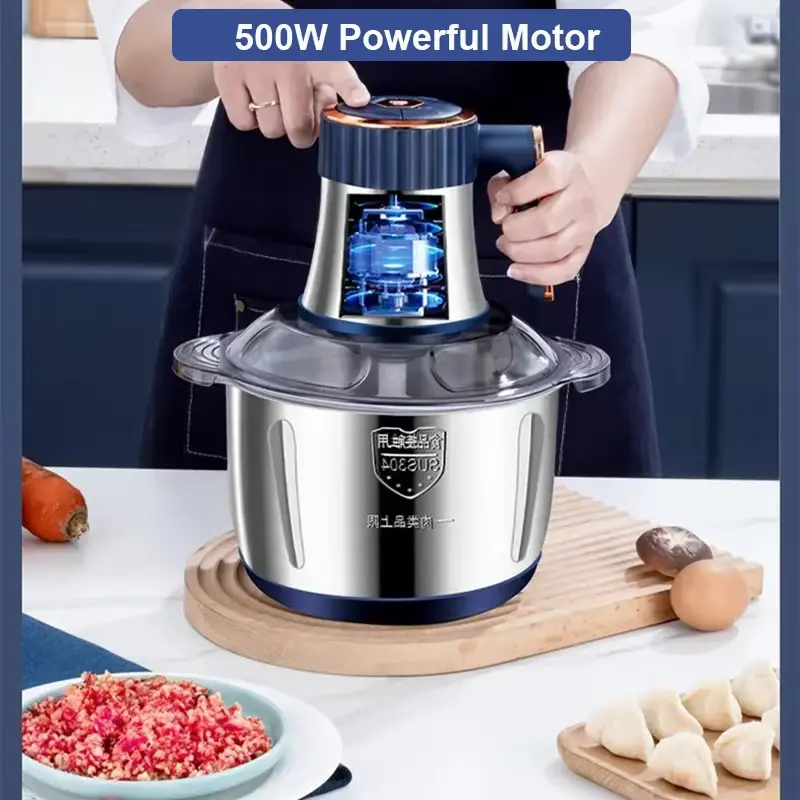 A kitchen food processor with a 500W powerful motor grinding meat on a wooden board.