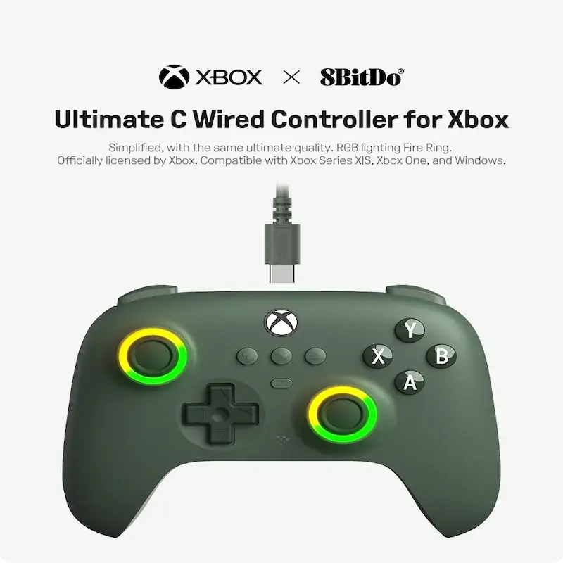 Top view of the 8BitDo Ultimate C Wired gaming controller for Xbox in dark green color with a connected USB cable.