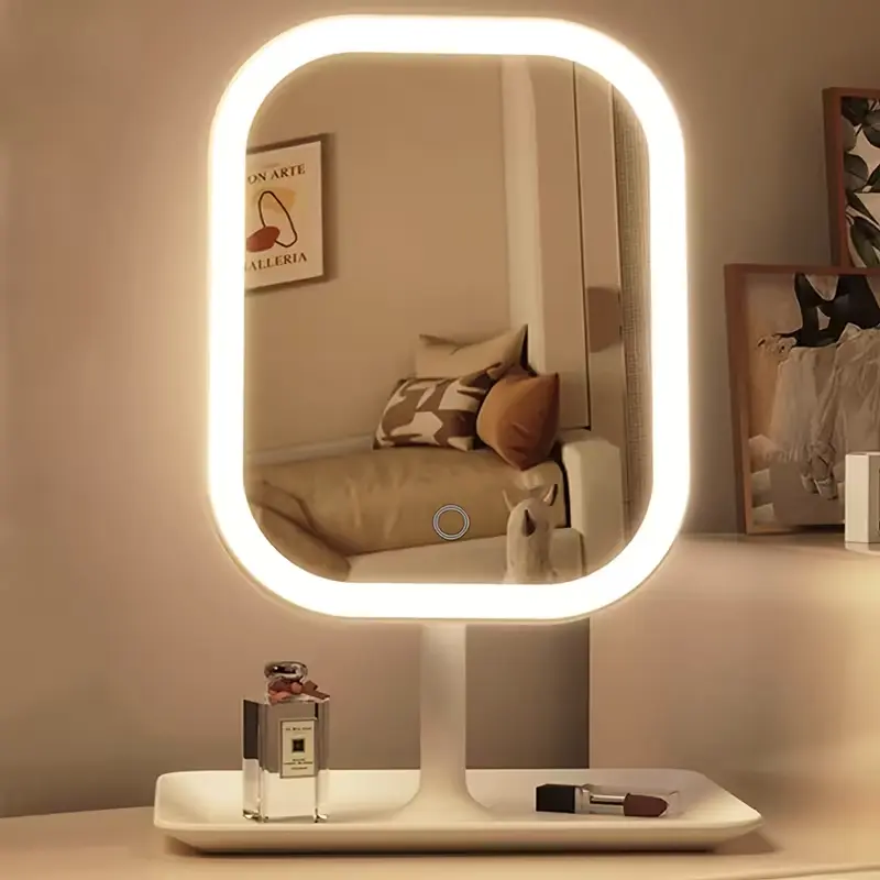 White LED makeup mirror on a vanity table with a warm lighting glow