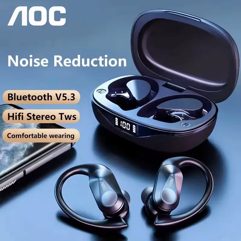 Black wireless earbuds placed next to an open charging box and a smartphone screen.