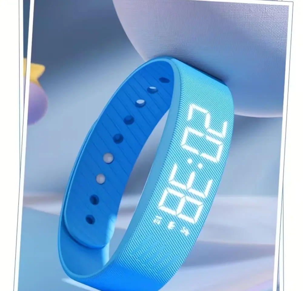 Close-up of the blue soft silicone strap and digital interface