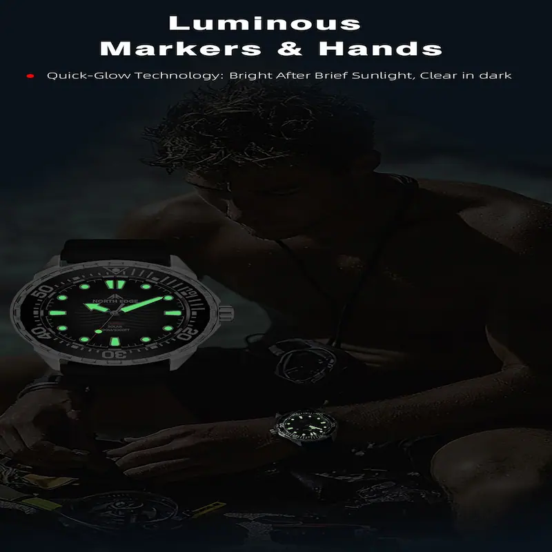 Luminous markers and hands of North Edge Triton watch glowing bright in the dark.