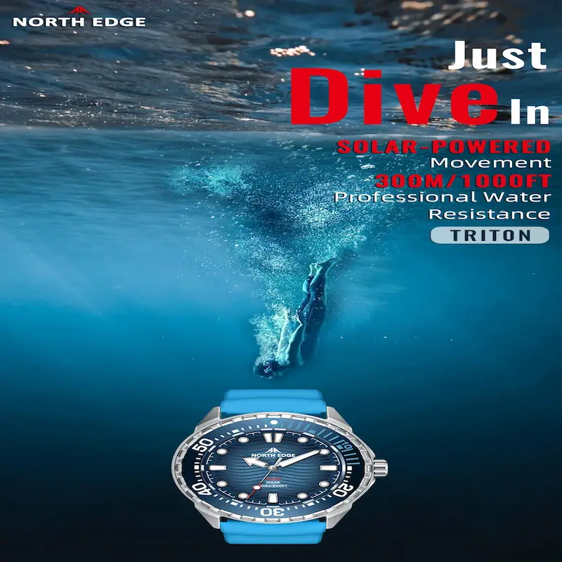 Diver plunging into deep water with North Edge Triton solar powered movement watch.