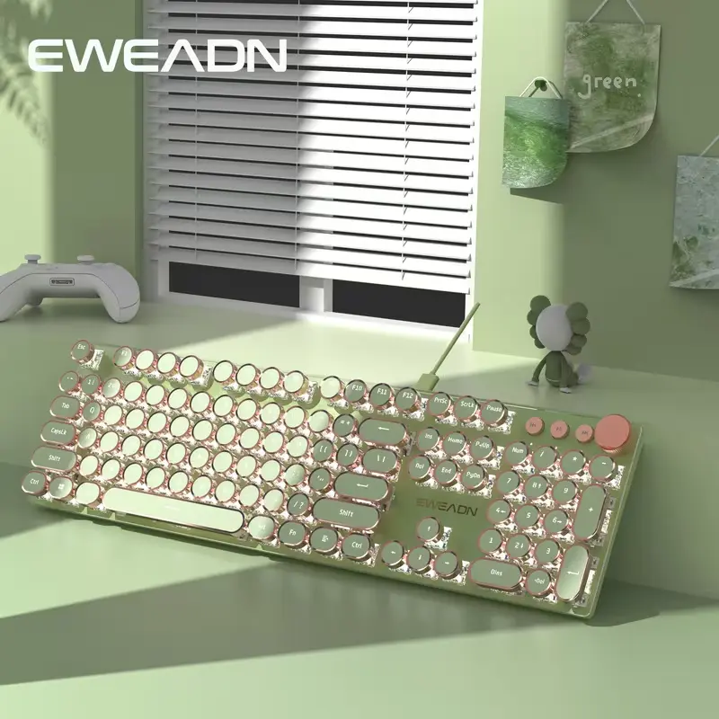 EWEADN retro typewriter mechanical keyboard in sage green on a cozy desk setup.