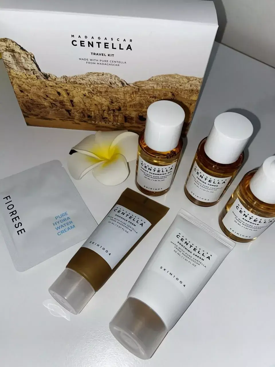 Real life shot of Madagascar Centella travel kit with box and 5 products