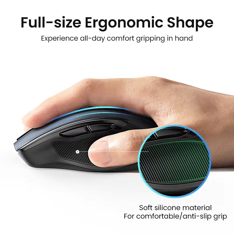 Side view of a hand resting on the UGREEN ergonomic mouse showing the soft silicone anti-slip grip.