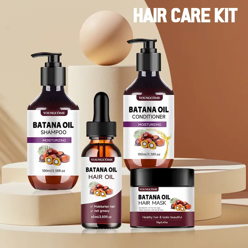 Four piece Batana Oil Hair Kit set arranged on display pedestals.