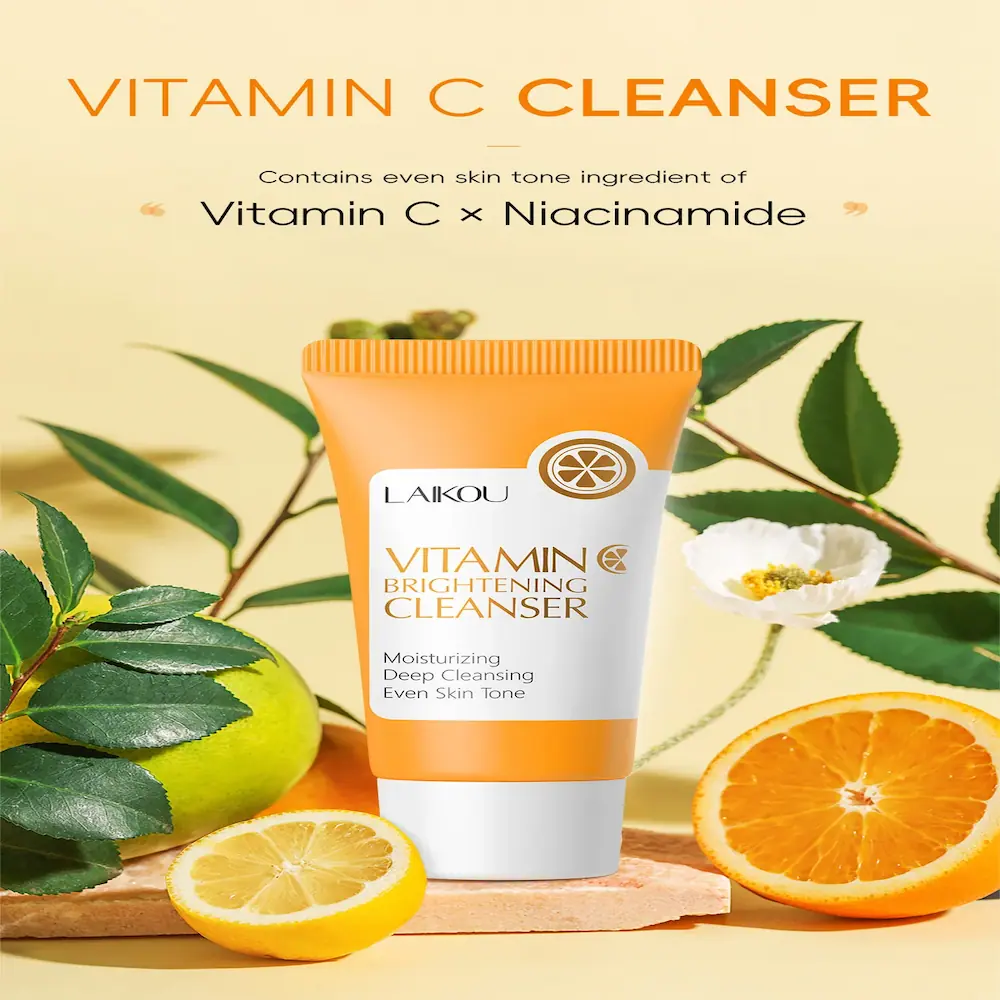 LAIKOU Vitamin Brightening Cleanser surrounded by fresh oranges and green leaves, highlighting Vitamin C and Niacinamide.