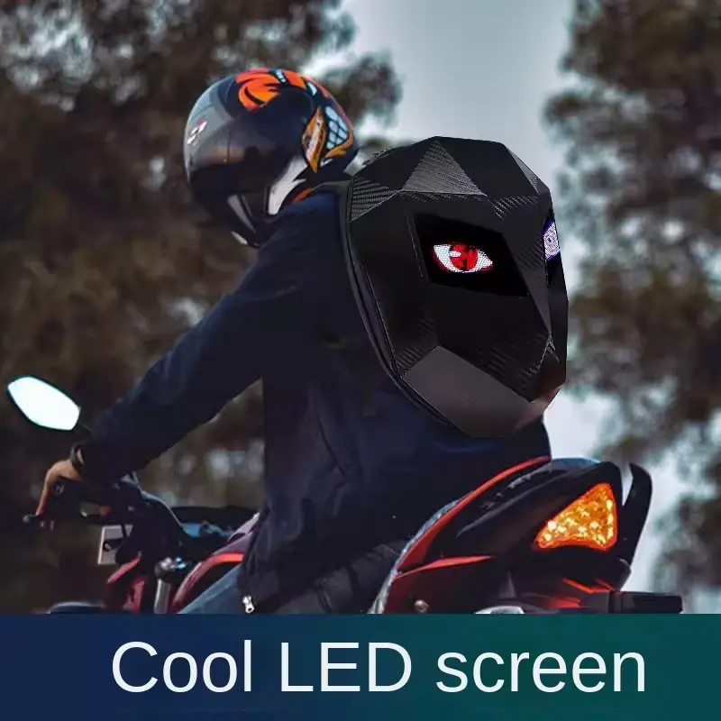 A biker wearing an LED Motorcycle Rider Backpack with illuminated eyes display while riding on the road.