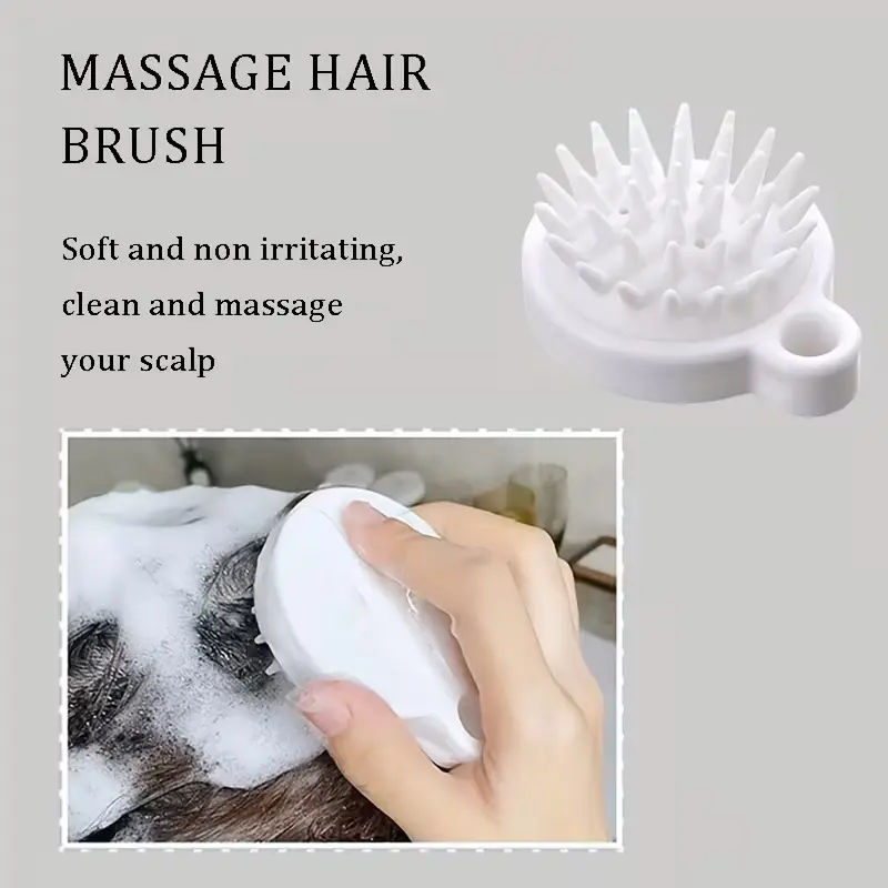 A white silicone scalp massage brush being used to clean and massage the scalp during hair wash.