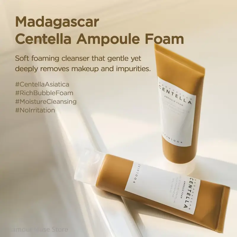 Two tubes of Madagascar Centella Ampoule Foam on a white surface with sunlight shadows.