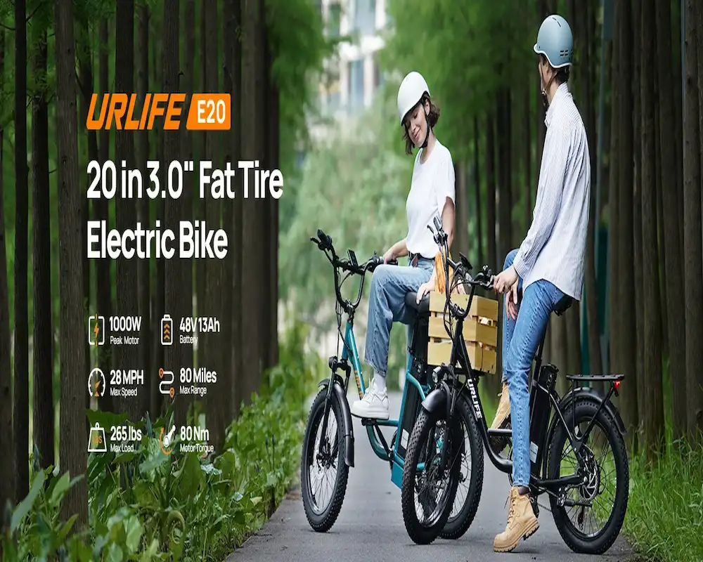 Two riders on URLIFE E20 electric bikes riding through a wooded park trail.