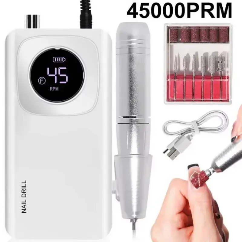 Sleek white portable body with silver handpiece and grinding attachments box.