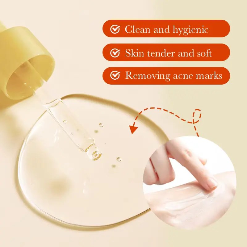 A close-up of clear liquid texture from BIOAQUA Turmeric Serum being applied to skin with a glass dropper.