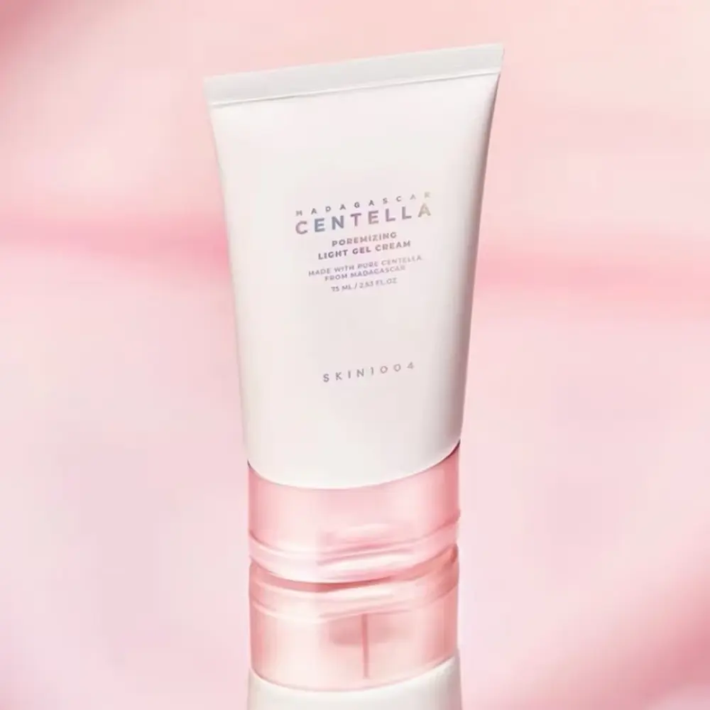 SKIN1004 Poremizing Gel Cream tube packaging standing on a light pink background.