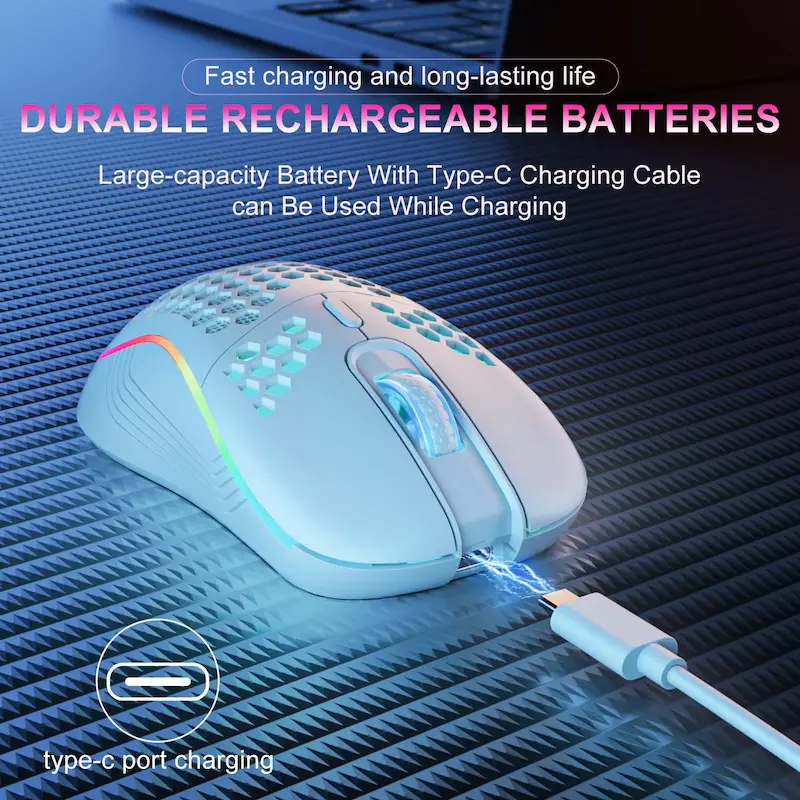 A white wireless gaming mouse review charging on a desk via a Type-C cable.