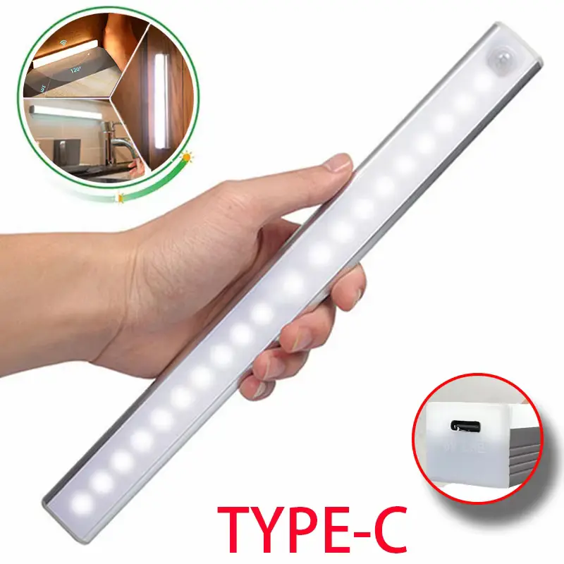 Wireless rechargeable motion sensor LED light held in hand showing Type-C charging port.