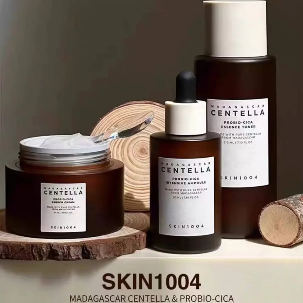 A close-up view of the SKIN1004 Probio-Cica Set products displayed on wooden decorative stands.