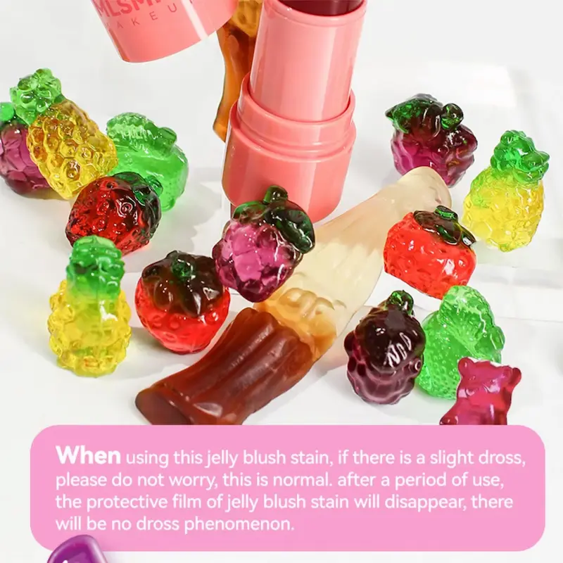 Hydrating makeup product surrounded by colorful fruit candy shapes.