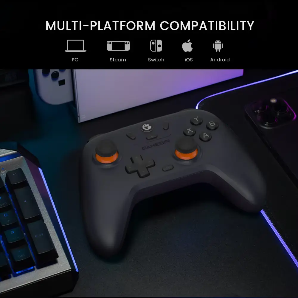 Wireless gaming pad set up neatly on a desk next to a keyboard and monitor setup.