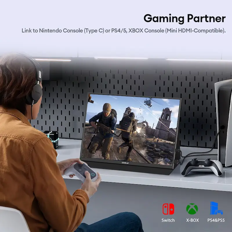 Gamer playing action video game connected to console with wireless controller on desk.