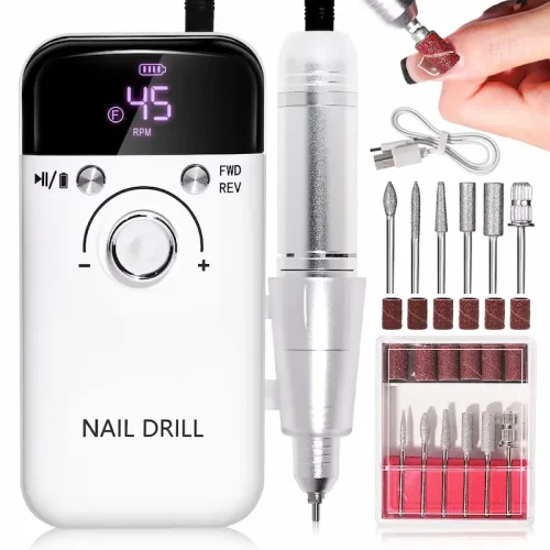A complete professional nail drill kit featuring a white rechargeable control box with a digital display, a silver handpiece, charging cable, and a set of metal drill bits with sanding bands.